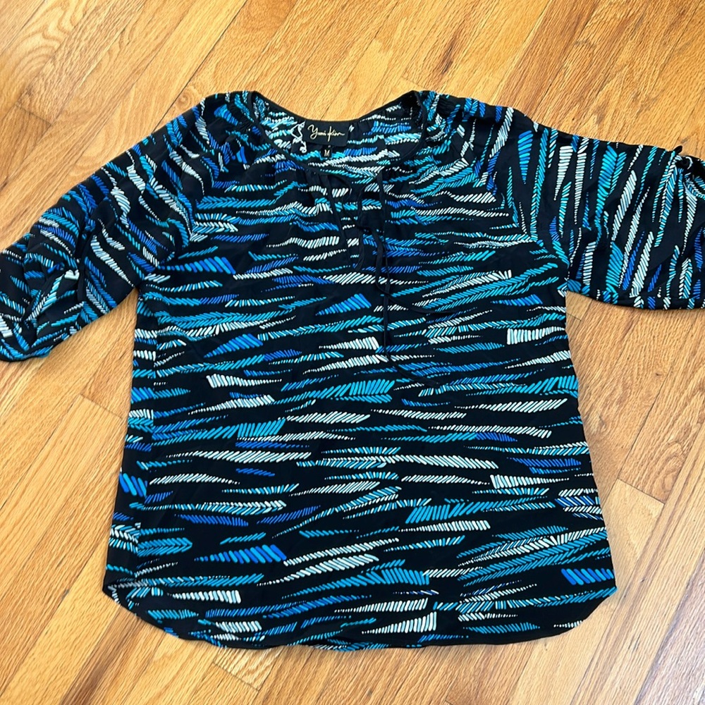 Yum i Kim 100% silk top. Really beautiful. Quality is incredible.